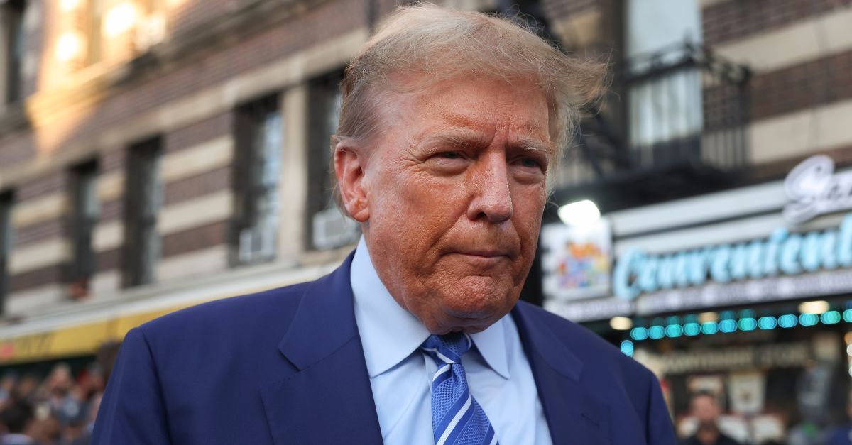 Former president Donald Trump, talks to members of the media while visiting a bodega, Tuesday, April 16, 2024. (AP Photo/Yuki Iwamura)